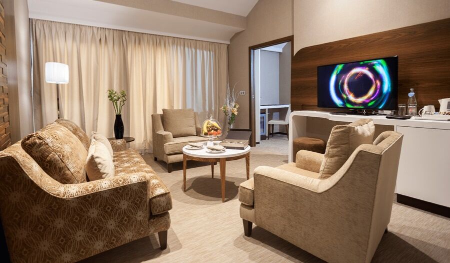 Hotel La Cigale Tabarka Exterior foto A living room in a hotel suite